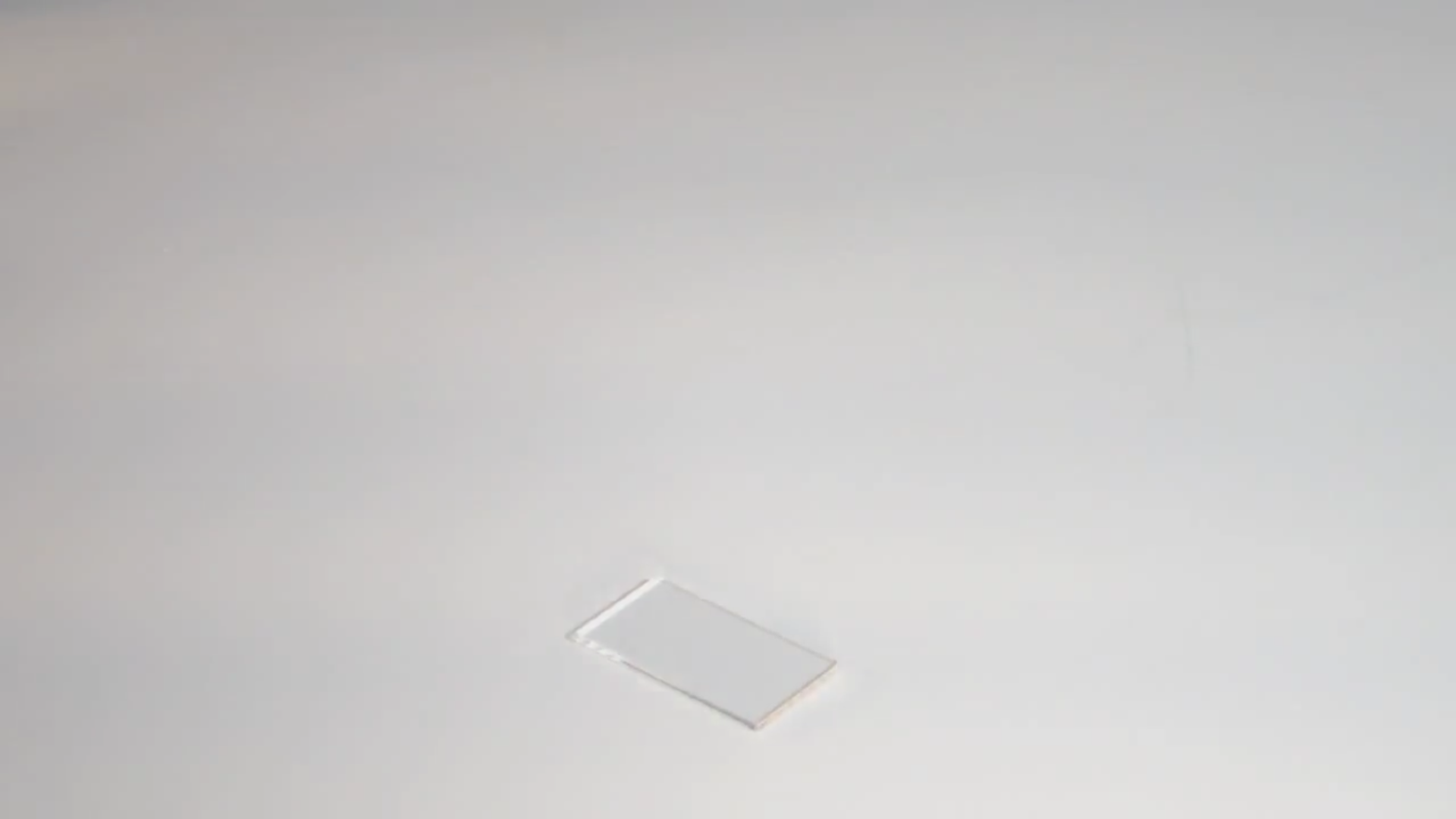 Biotic Games Step Step 15 - Microscope slide: peel off cover foil